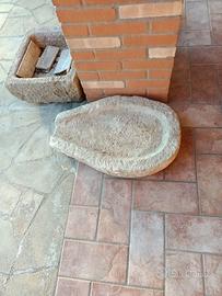 Manufatti in pietra datati in trachite  e  granito