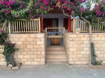 Villetta indipetente con giardino + posto auto