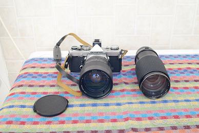 olympus om 1 md  con 2 tokina rmc funzionante
