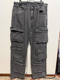 Jeans nero slavato con tasconi