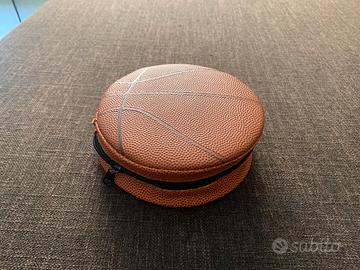 Porta CD come pallone da rugby