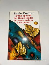 Sulla sponda del fiume piedra mi sono seduto e ho