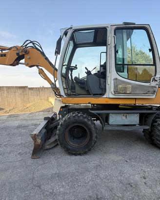 Escavatore gommato Liebherr A309 — anno 2008