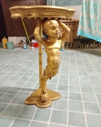 Putto angoliera  in  ebano finitura foglia oro 