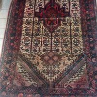 Vecchio tappeto persiano