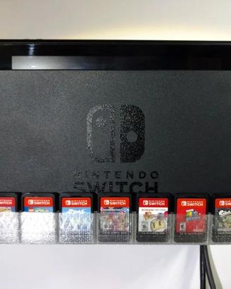 Supporto a parete con porta giochi Nintendo Switch