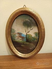 Dipinto paesaggistico con cornice ovale dorata