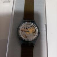 Swatch automatico celeste San100