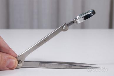 Pinzette pubblicitarie con lente Prasterol