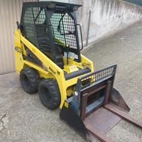 Minipala Bobcat 453 12 Quintali con forche.