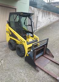 Minipala Bobcat 453 12 Quintali con forche.