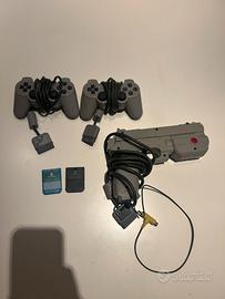 playstation 1: 2 controller, pistola G-Con, 2 card