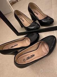Scarpe con tacchi alti