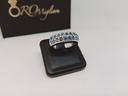 anello-in-oro-bianco-18-kt-con-topazi-azzurri