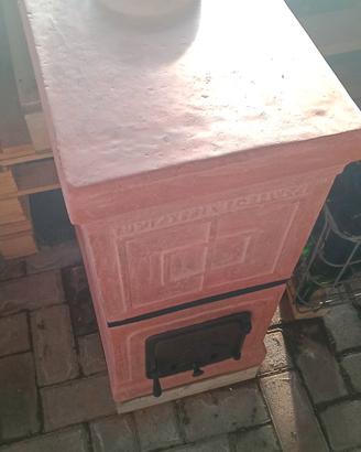 stufa in terracotta restaurata antica 