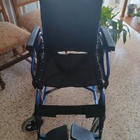 Sedia a rotelle con ruote piccole NUOVA