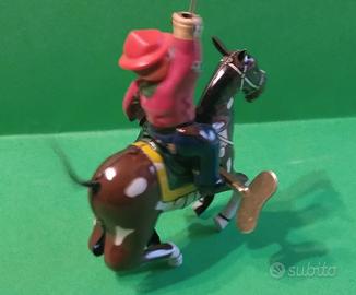 Cavaliere in latta a molla