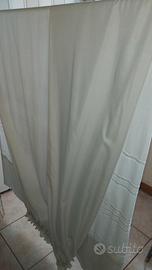 Tenda coprente per portafinestra