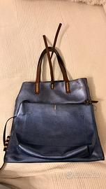 Manila Grace Felicia con pochette abbinata