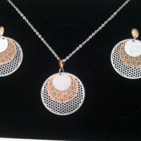 parure orecchini e colliere in acciaio