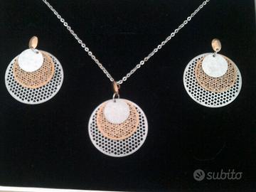 parure orecchini e colliere in acciaio