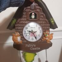orologio a cucu  con uccellino che canta 