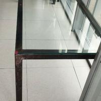 Tavolo in vetro e ferro