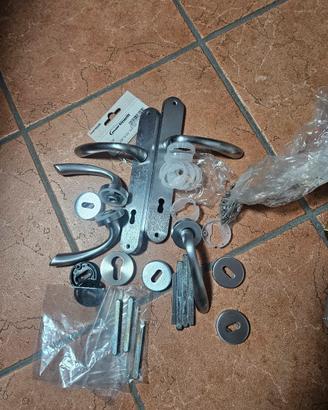 maniglie Martinelli per porte e finestre argento