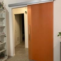 Porta in vetro a scorrimento