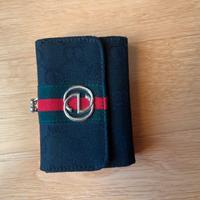 portafoglio gucci in tela monogramma 