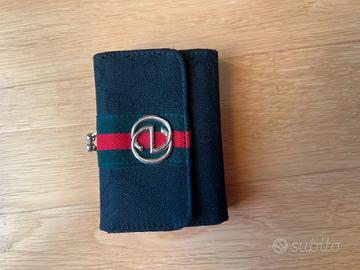 portafoglio gucci in tela monogramma 