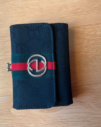 portafoglio gucci in tela monogramma 