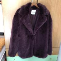 Giacca corta in eco pelliccia