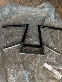 2 manubri e piastre per forcelle