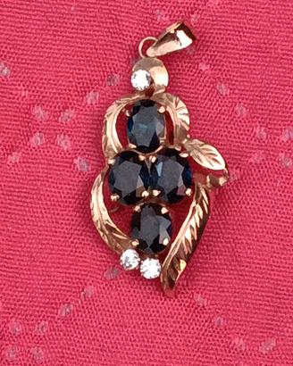 CIONDOLO IN ORO ROSA CON INCASTONATI 4 ZAFFIRI BLU