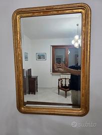 Specchio di fine 1700 con cornice dorata.