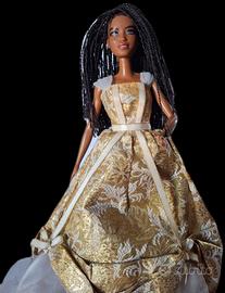 Barbie con il vestito color oro 