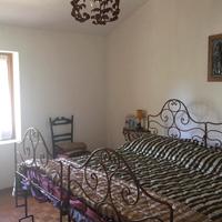 Letto von comodini in ferro battuto