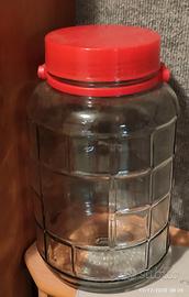 contenitore in vetro con coperchio a vite.