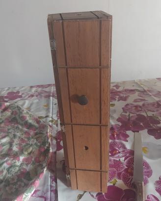 Tre portabottiglie in legno 