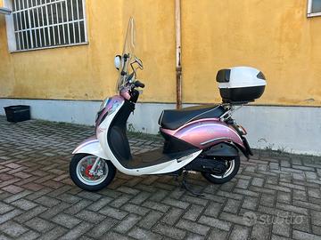Sym MIO 100