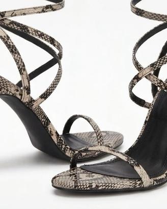 Tacchi serpente bianco e nero