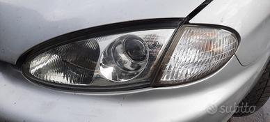 HYUNDAI COUPE TIBURON 2000 - FARO ANTERIORE SINIST