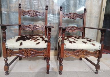 antiche poltrone legno di rovere e vera pelle.