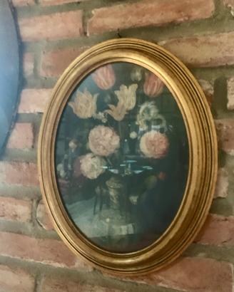 Quadro ovale floreale con cornice dorata