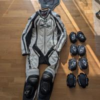 tuta moto taglia 46 spike + 3 set saponette nuove