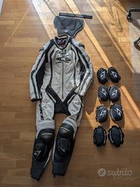 tuta moto taglia 46 spike + 3 set saponette nuove