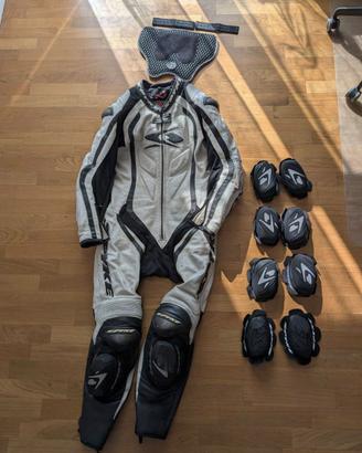 tuta moto taglia 46 spike + 3 set saponette nuove