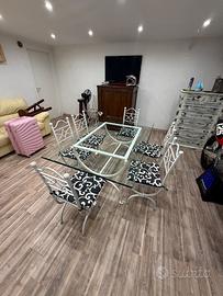 Tavolo in cristallo con base in ferro