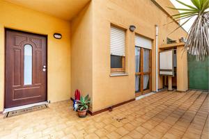 Quadrivano con cortile e posto auto